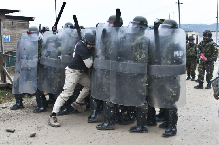 Multinational soldiers deal with riots, fire at JMRC